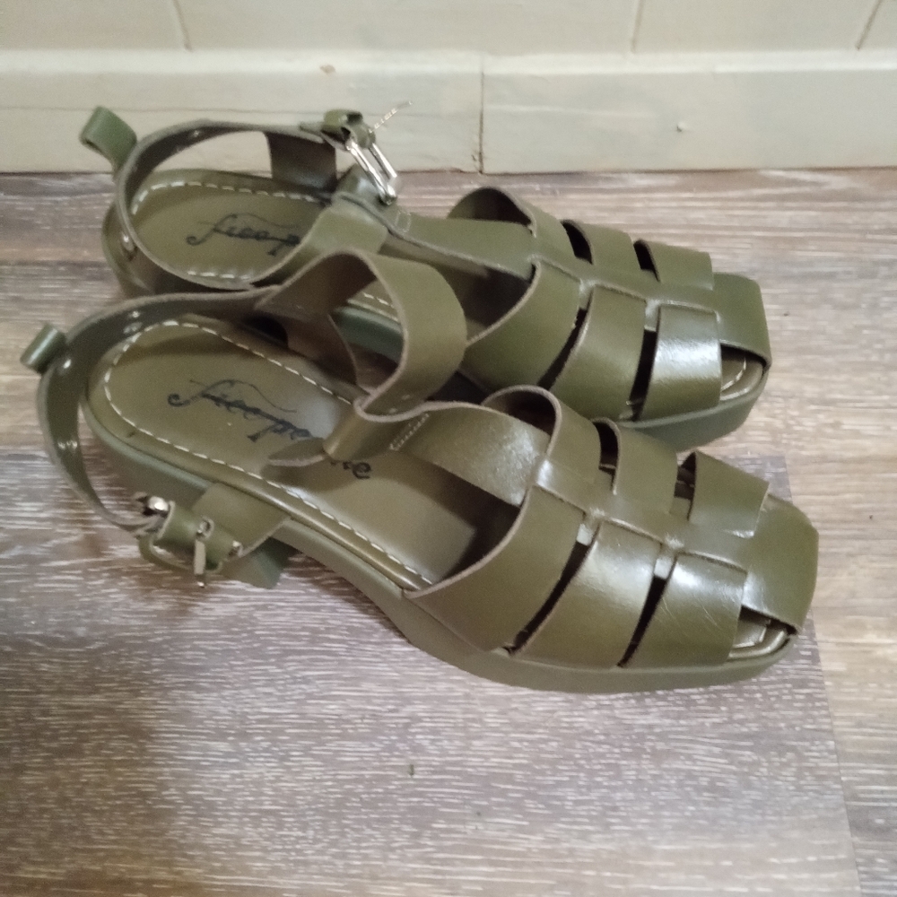 Free People, closed toe, waterproof sandal heel.